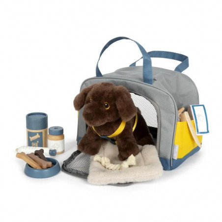 Hund mit Tasche und Pflege-Set